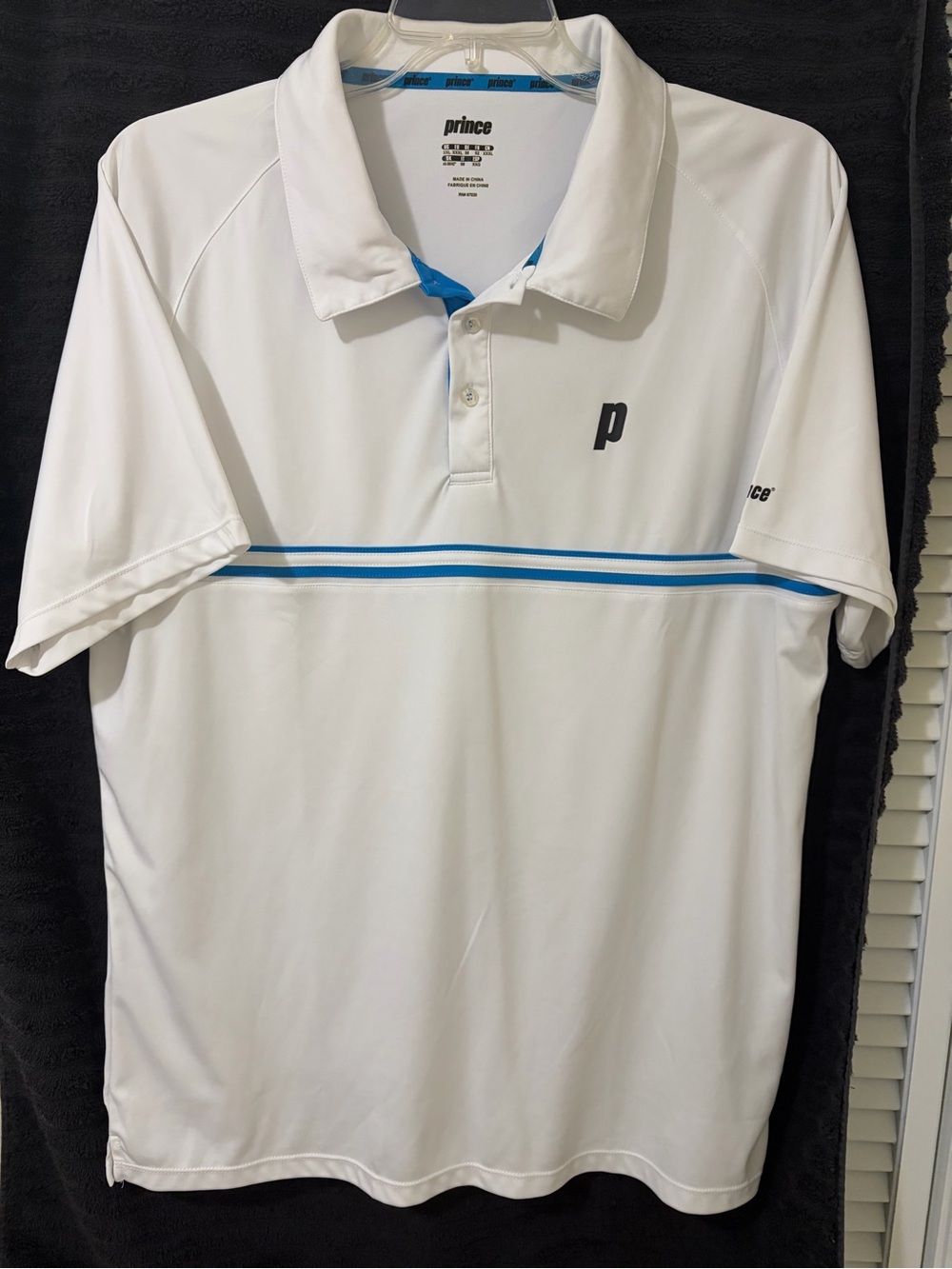 Prince White Tennis Polo with Blue Trim and Chest Logo